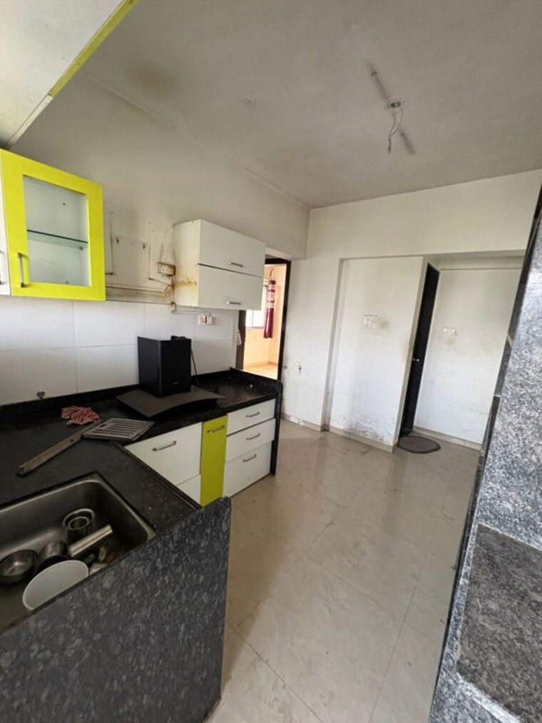 Kitchen, chandrarang-10-elite-akasa 2 Bedroom 812 Sq.Ft. Builder Floor In Pimple Gurav Pune 10393584