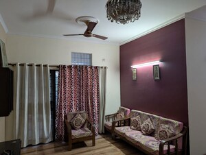Living Room in 4 BHK Apartment at Exotica Elegance, Vaibhav Khand – for Sale