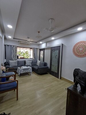 Living Room in 2 BHK Apartment at Pareira Nagar CHS, Ganeshwadi – for Rent
