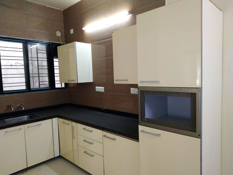 Kitchen, symphony-apartment-bhosale-nagar 3 Bedroom 1500 Sq.Ft. Apartment In Bhosale Nagar Pune 10393641