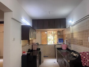 Kitchen in 2 BHK Apartment at Dwarka Suncrest Phase 2, Rahatani – for Rent