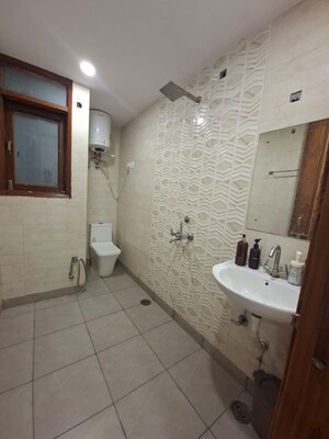 Bathroom in 2 BHK Apartment at Chattarpur – for Rent