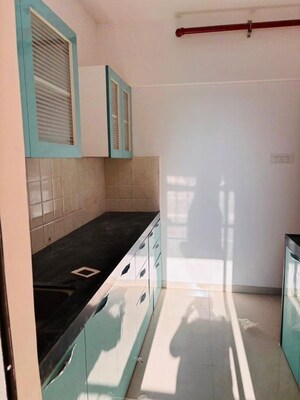 Kitchen in 2 BHK Apartment at Shapoorji Pallonji Joyville Hinjawadi Phase 6, Hinjewadi – for Rent