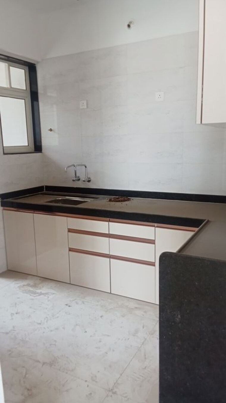Kitchen, home-manmohan-residency 2 Bedroom 1050 Sq.Ft. Apartment In Kondhwa Budruk Pune 10393807