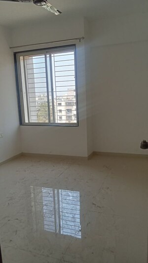 Room in 2 BHK Apartment at Home Manmohan Residency, Kondhwa Budruk – for Sale