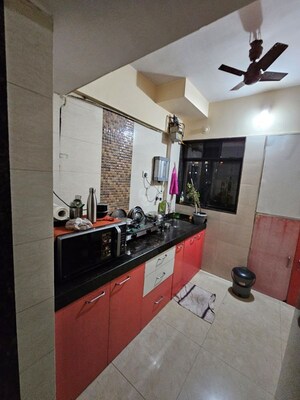Kitchen in 2 BHK Apartment at Madhav Sansar, Kalyan West – for Sale