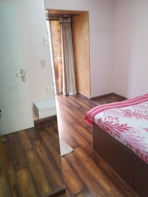 Bedroom in 2 BHK Apartment at Model Town, Andheri West – for Rent