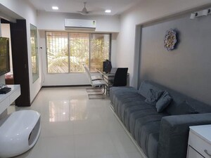 Living Room in 2 BHK Apartment at Model Town, Andheri West – for Rent
