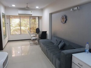 Living Room in 2 BHK Apartment at Model Town, Andheri West – for Rent
