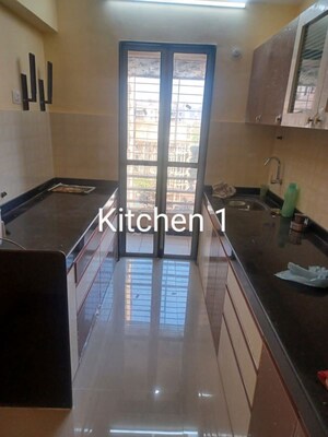 Kitchen/pantry in 1.5 BHK Apartment at Hubtown Greenwoods D Wing, Vartak Nagar – for Rent