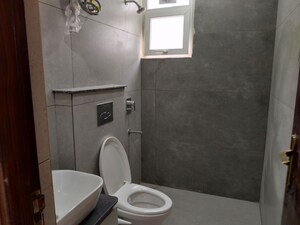 Bathroom in 2 BHK Apartment at Jaipuria Sunrise Green, Lohgarh – for Rent
