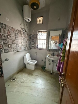 Bathroom in 2 BHK Builder Floor at Kalkaji – for Rent