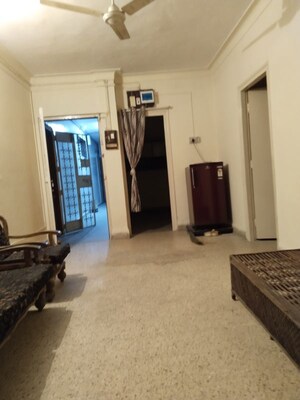 Living Room in 1 BHK Apartment at Dinshaw House, Camp – for Rent
