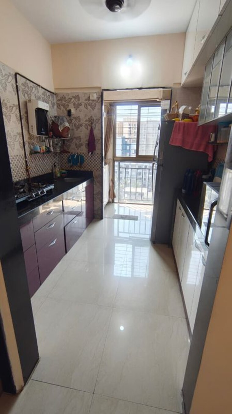 Kitchen, space-residence 2 Bedroom 850 Sq.Ft. Apartment In Mira Road Thane 10394091