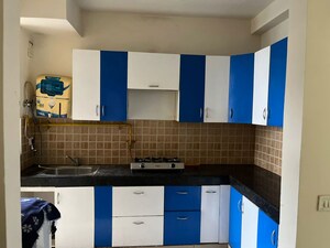 Kitchen in 3 BHK Apartment at Town Park White Orchid, Sector 16c Greater Noida – for Rent