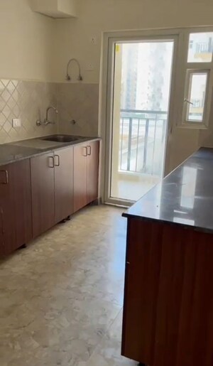 Kitchen in 3 BHK Apartment at Amrapali Terrace Homes, Tech Zone 4 Greater Noida – for Sale