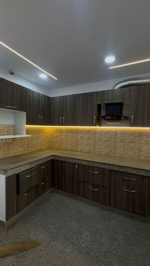 Kitchen in 3 BHK Apartment at Raheja Vedaanta, Sector 108 – for Rent