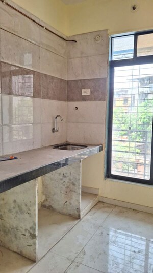 Kitchen in 1 BHK Apartment at Mangalam Swastik Residency, Ulwe Sector 23 – for Rent