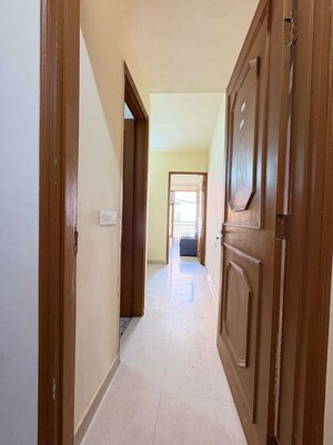 Building Lobby in 1 BHK Apartment at Sainik Farm – for Rent