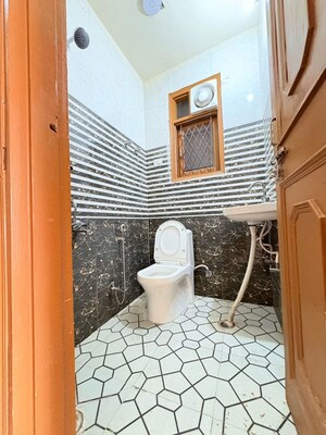 Bathroom in 1 BHK Apartment at Sainik Farm – for Rent