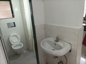Bathroom in 1 BHK Apartment at Laxmi Plaza, Patlipada – for Rent