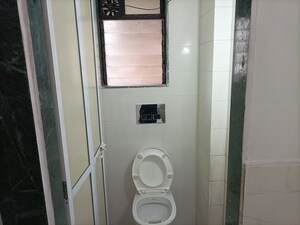 Bathroom in 1 BHK Apartment at Laxmi Plaza, Patlipada – for Rent