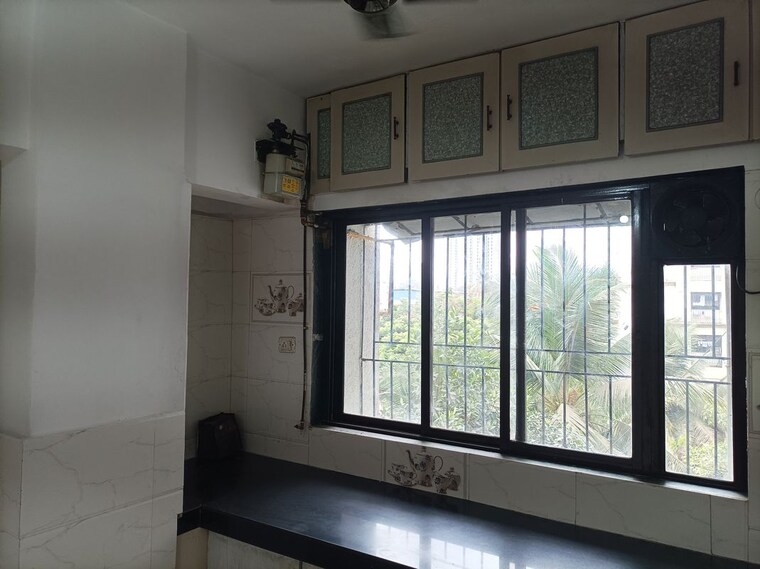 Kitchen, laxmi-plaza 1 Bedroom 555 Sq.Ft. Apartment In Patlipada Thane 10394244
