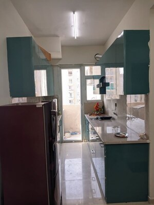 Kitchen in 2 BHK Apartment at Signature The Millennia 2, Sector 37d – for Rent