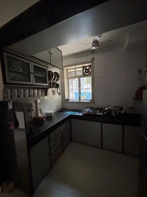 Kitchen in 2 BHK Apartment at Sundar Nagar CHS, Malad West – for Rent