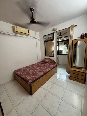 Living Room in 2 BHK Apartment at Sundar Nagar CHS, Malad West – for Rent