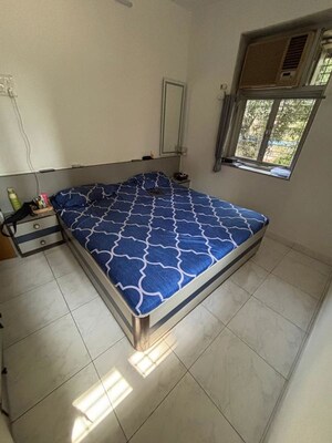 Bedroom in 2 BHK Apartment at Sundar Nagar CHS, Malad West – for Rent