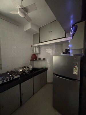 Kitchen in 2 BHK Apartment at Sundar Nagar CHS, Malad West – for Rent
