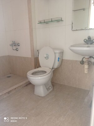 Bathroom in 2 BHK Apartment at Hiranandani Estate Corsica, Ghodbunder Road – for Rent