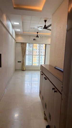 Living Room in 1.5 BHK Apartment at Dosti West County, Balkum Pada – for Sale