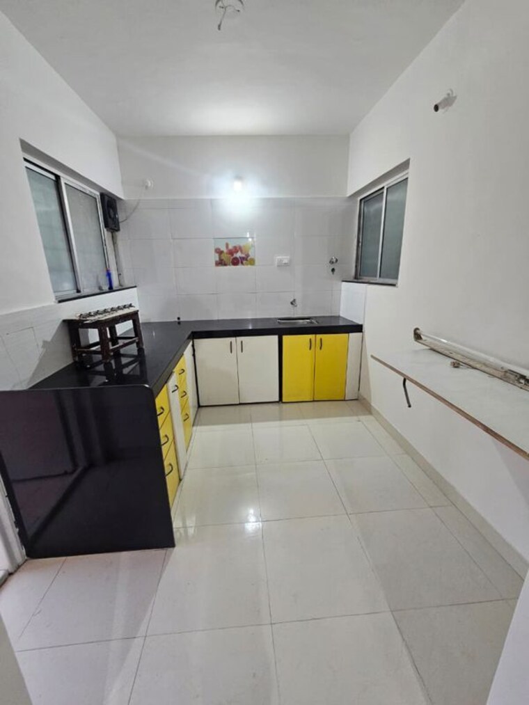 Kitchen, kamgar putala vasahat 2 Bedroom 750 Sq.Ft. Apartment In Kamgar Putala Vasahat Pune 10394535