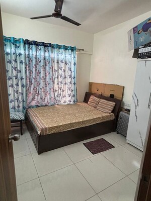 Bedroom in 2 BHK Apartment at Kolte Patil Life Republic Oro Avenue, Hinjewadi – for Rent