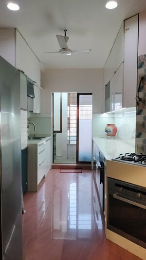 Kitchen in 3 BHK Apartment at Oberoi Realty Woods, Goregaon East – for Sale