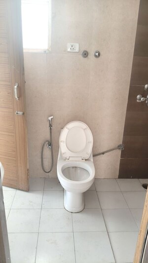 Bathroom in 2 BHK Apartment at JKG Palm Resort, Raj Nagar Extension – for Rent