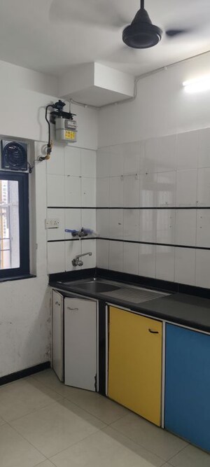 Kitchen in 4 BHK Apartment at Montreal Tower, Andheri West – for Sale
