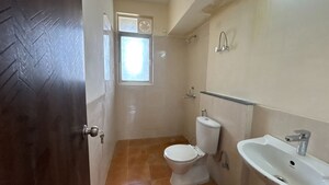 Bathroom in 3 BHK Apartment at Jaypee Kensington Park Apartments, Sector 133 – for Rent