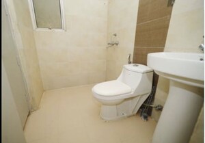 Bathroom in 3 BHK Apartment at Raj Nagar Extension – for Sale