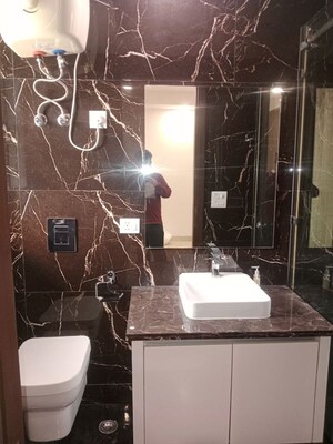 Washroom in 4 BHK Builder Floor at Green Park Extension – for Rent