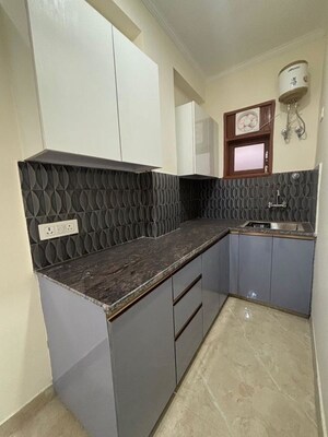 Kitchen in 1 BHK Builder Floor at Sainik Farm – for Sale