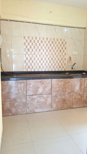 Kitchen in 2 BHK Apartment at Bilad Bloom Field, Ulwe Sector 18 – for Rent