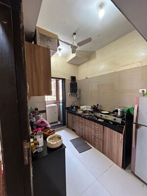 Kitchen in 3 BHK Apartment at K Raheja Heights, Malad East – for Rent