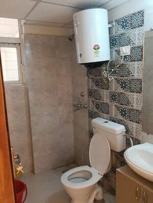 Bathroom in 2 BHK Apartment at Signature Global Proxima, Sector 89 – for Rent