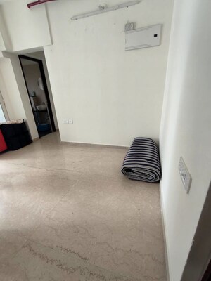 Living Room in 1 BHK Apartment at Omkar Signet, Malad East – for Rent