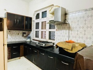 Kitchen in 3 BHK Builder Floor at Migsun Alpha Central, Alpha Ii Greater Noida – for Rent