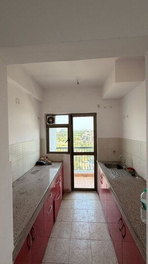 Kitchen in 3 BHK Apartment at Amrapali Centurian Park Phase II, Tech Zone 4 Greater Noida – for Sale