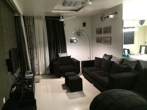 Living Room in 1.5 BHK Apartment at Gera 77, Kalyani Nagar – for Rent